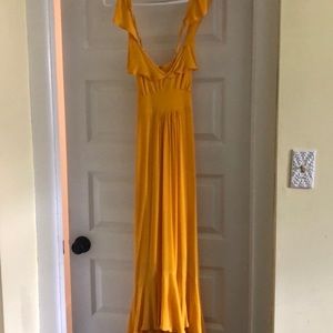 Larke from Anthropologie yellow sleeveless maxi dress
